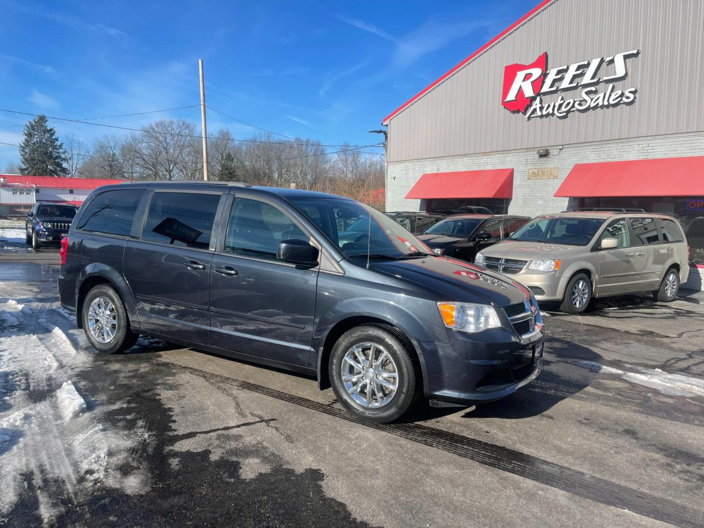 2014 Gray /Black Dodge Grand Caravan SXT (2C4RDGCG9ER) with an 3.6L V6 DOHC 24V FFV engine, 6 Speed Automatic transmission, located at 547 E. Main St., Orwell, OH, 44076, (440) 437-5893, 41.535435, -80.847855 - This 2014 Dodge Grand Caravan SXT is equipped with a rear entertainment system and STOW N GO seating, allowing for easy storage and flexibility. It also features a back-up camera, providing added convenience and safety when parking or reversing. With its versatile seating and entertainment options, - Photo#3